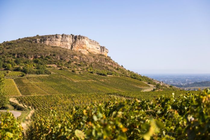 Limestone,Cliff,Of,Roche,Du,Vergisson,Overlooking,The,Vineyard,Of